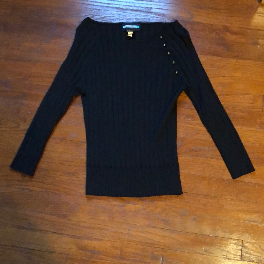 a black sweater with gold buttons. worn once.